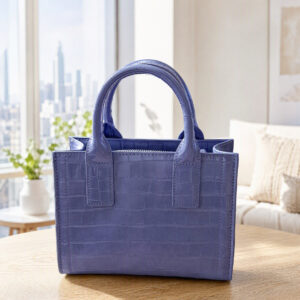 Purple handbag with crocodile print